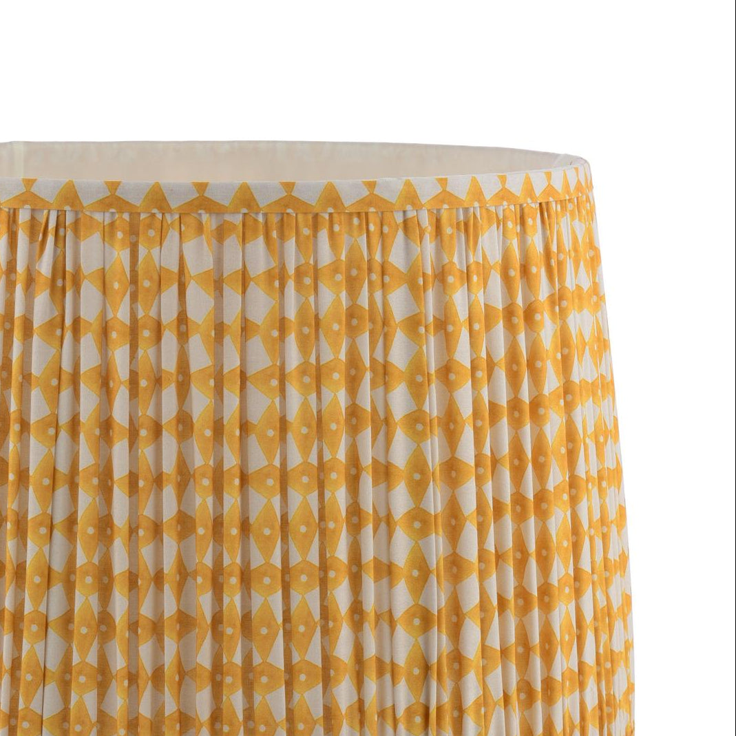 Pleated drum lampshade with yellow and white geometric pattern