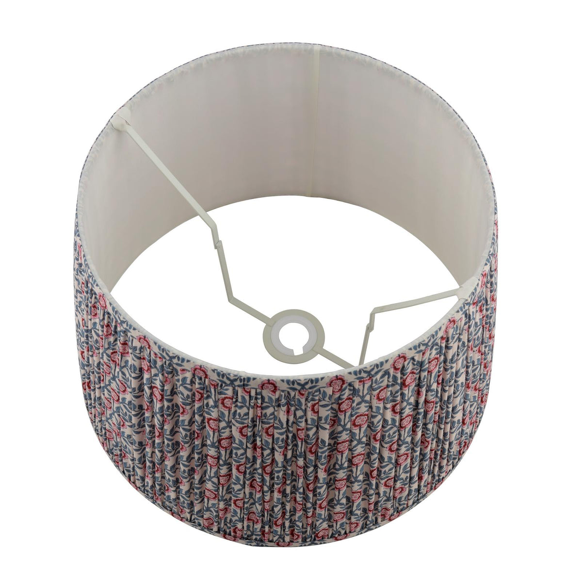 Round pleated lampshade with a blue and red floral pattern on a cream background