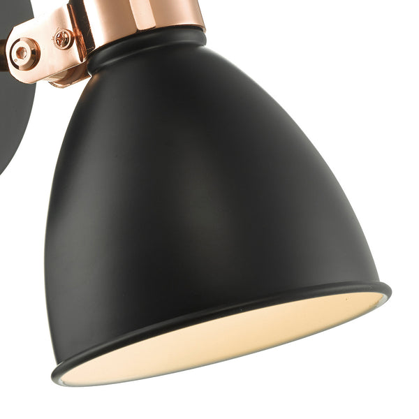 Close up of a black and copper wall light
