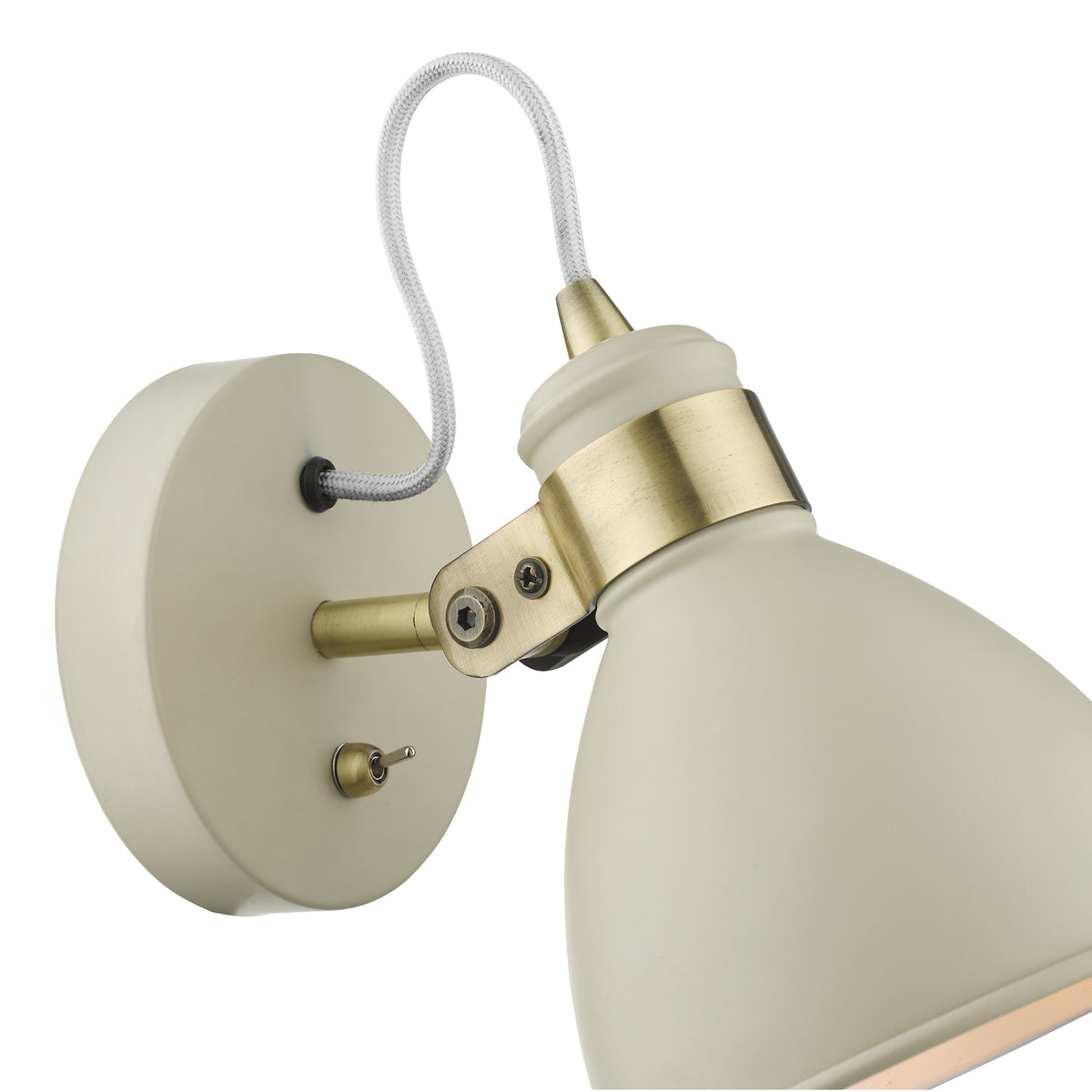 Cream wall light with a brass adjustable arm and a braided white cable