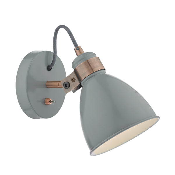 Grey wall light with a copper-colored adjustable arm and a grey braided cord