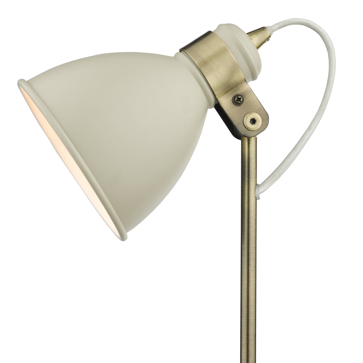 Cream metal lamp shade with a brass adjustable joint and pole, and a white braided cord