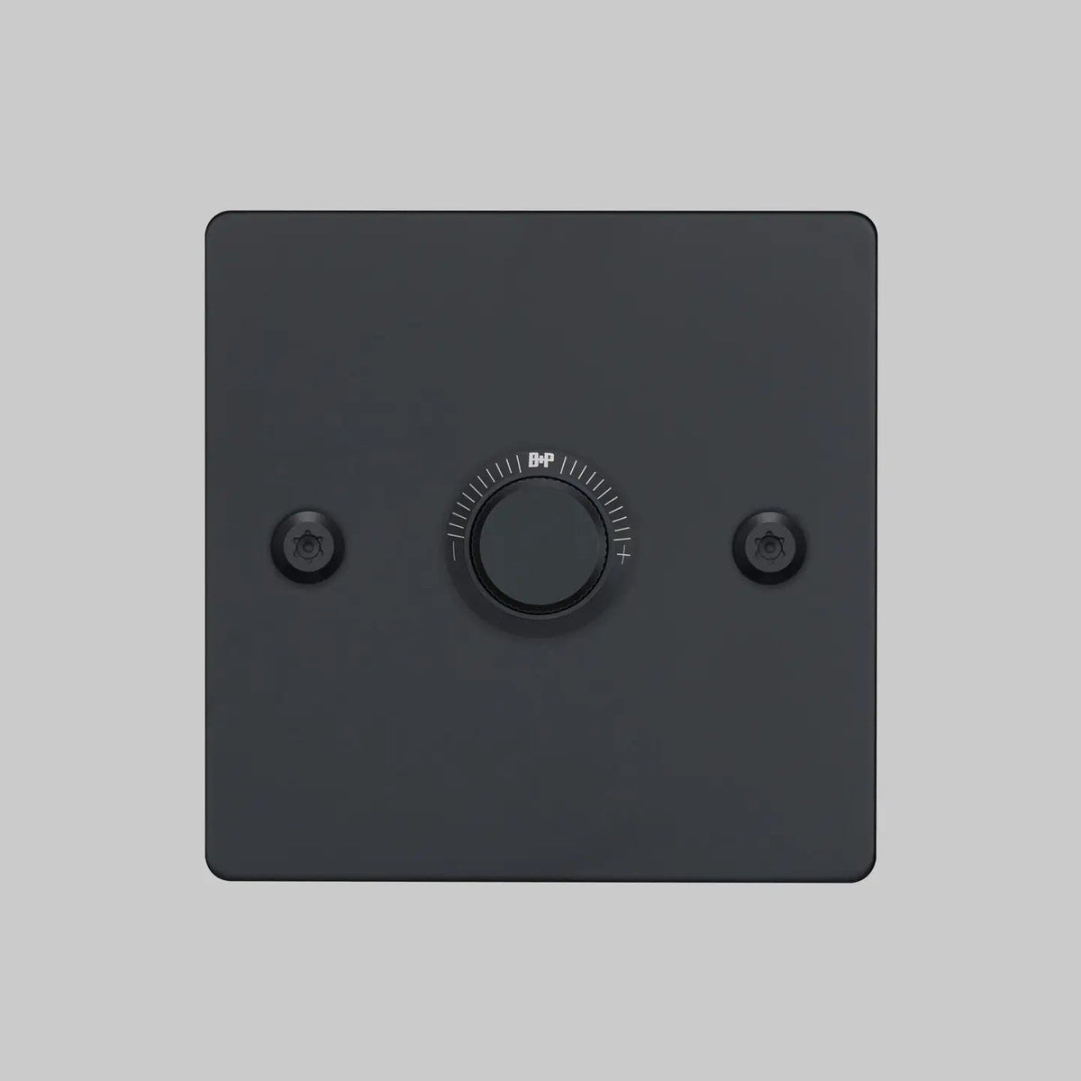 Black square dimmer switch with a central rotary knob and two visible screws