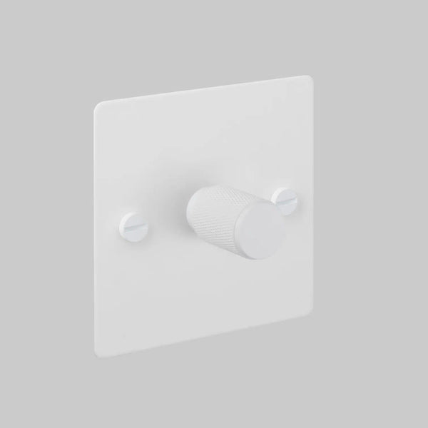 White dimmer switch with a textured knob and two visible screws