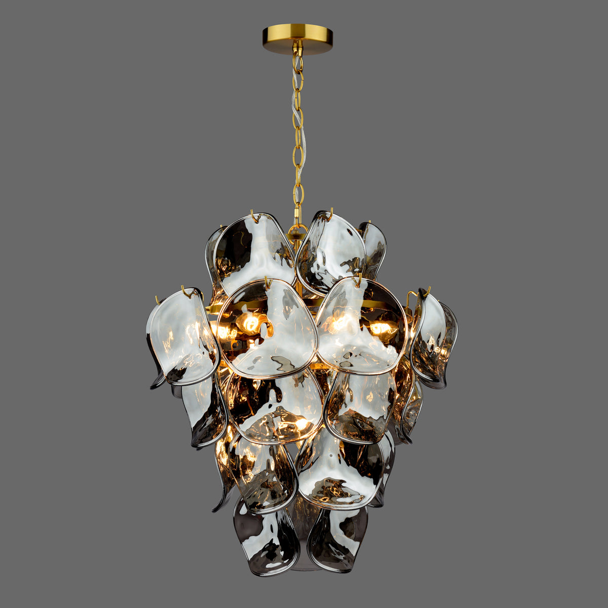 Gold and glass chandelier with leaf-shaped glass panels