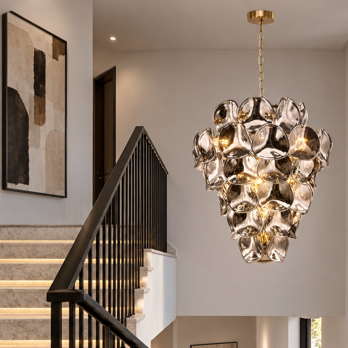 Genoa Twelve Light Chandelier in Natural Brass with Smoked Glass Panels