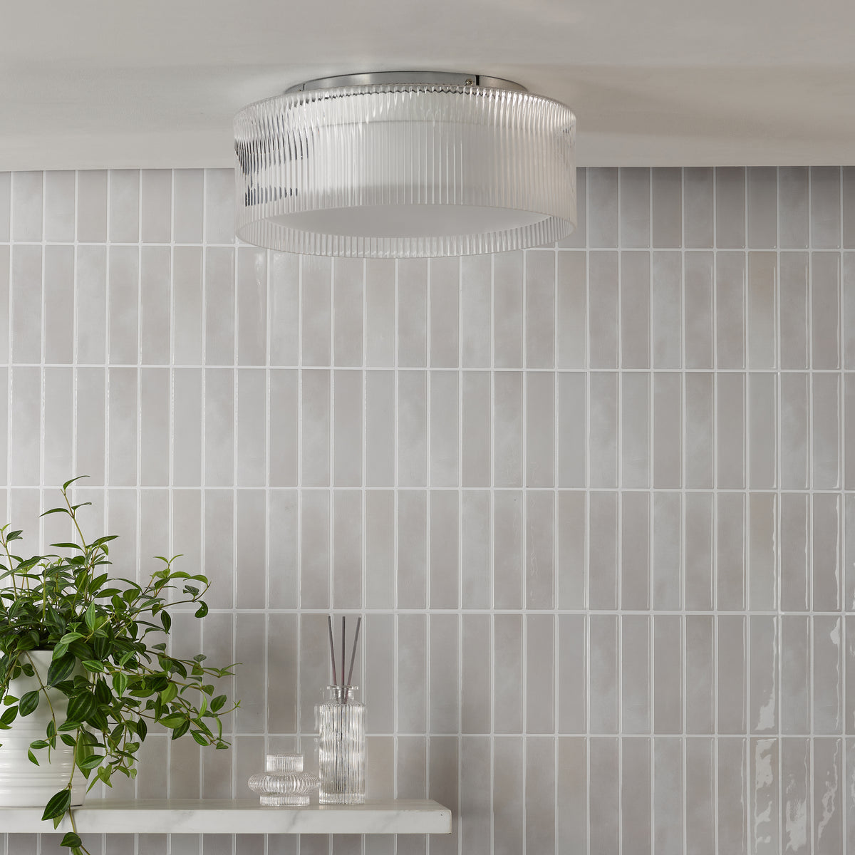 Geryon IP44 Flush Ceiling Light In Polished Chrome with Ribbed Glass Shade