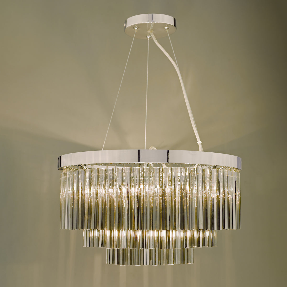 Tiered chandelier with clear glass rods and a polished chrome finish.