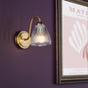 Glynis Wall Light in Antique Bronze with Clear Ribbed Glass