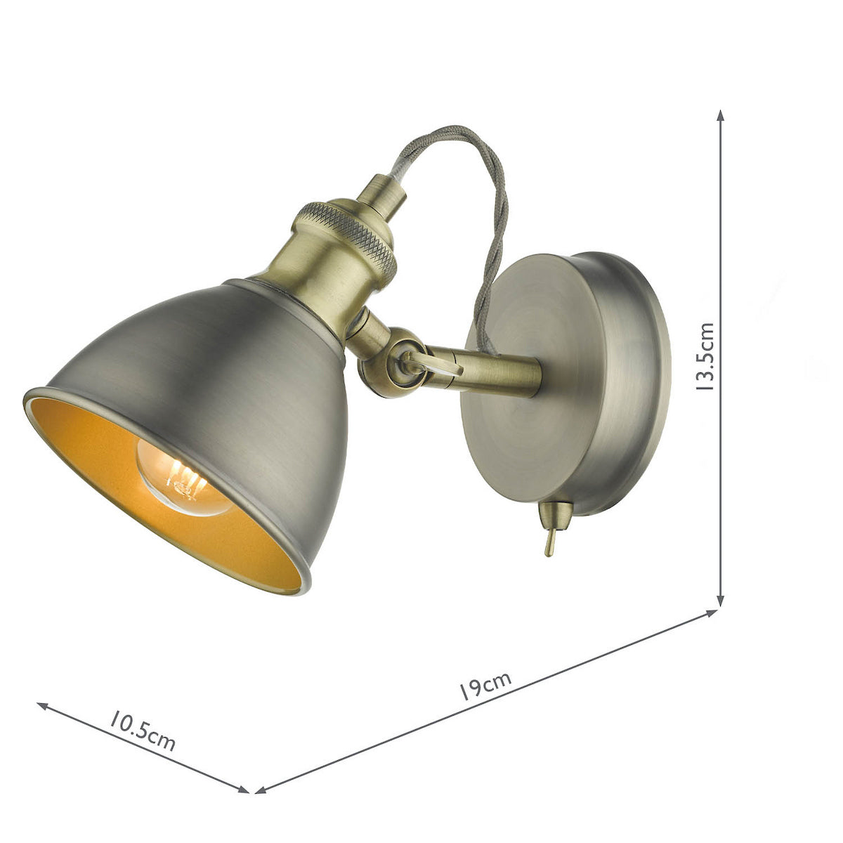 Antique brass wall light with a directional shade and exposed bulb, with dimensions.