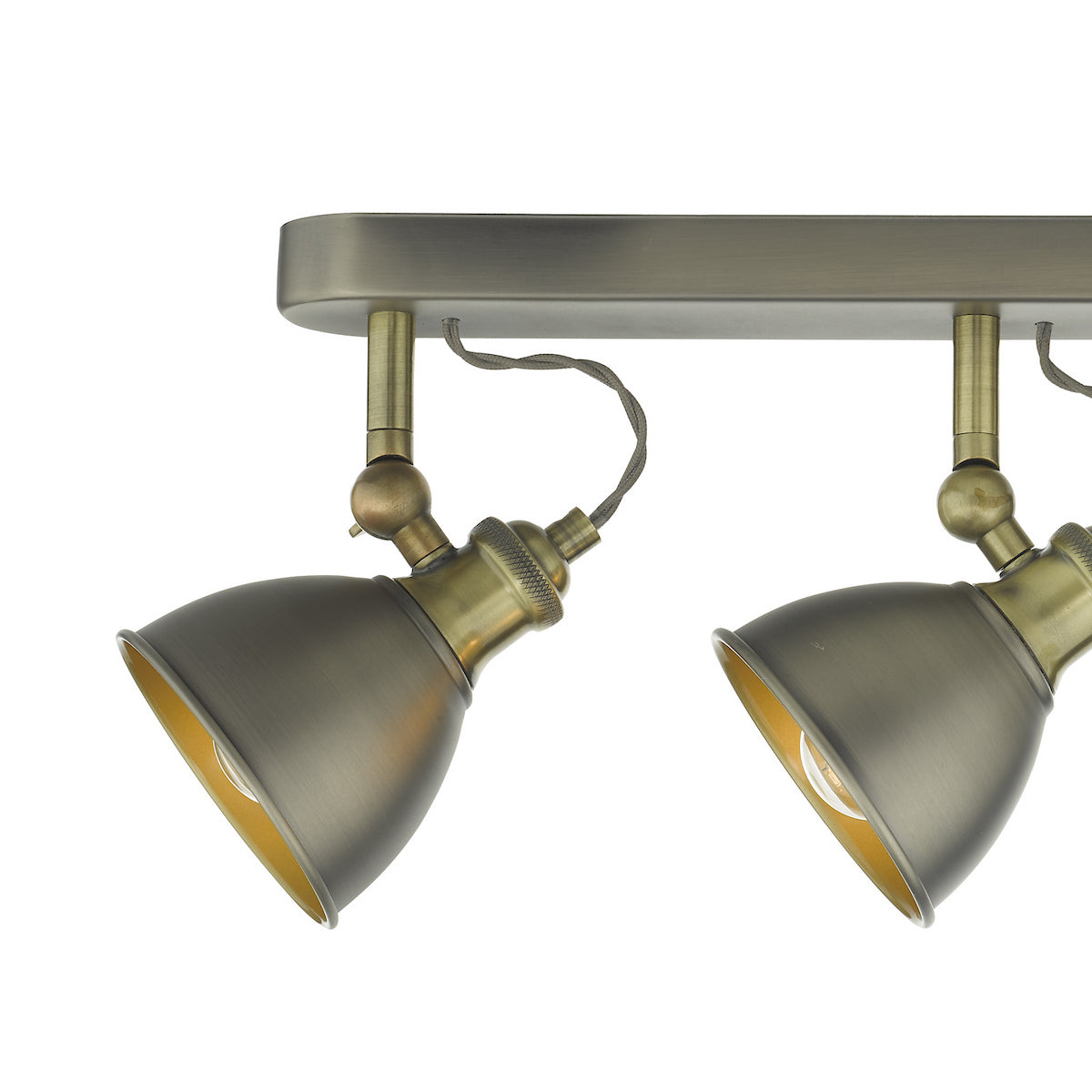 Two antique brass adjustable track lights with exposed bulbs