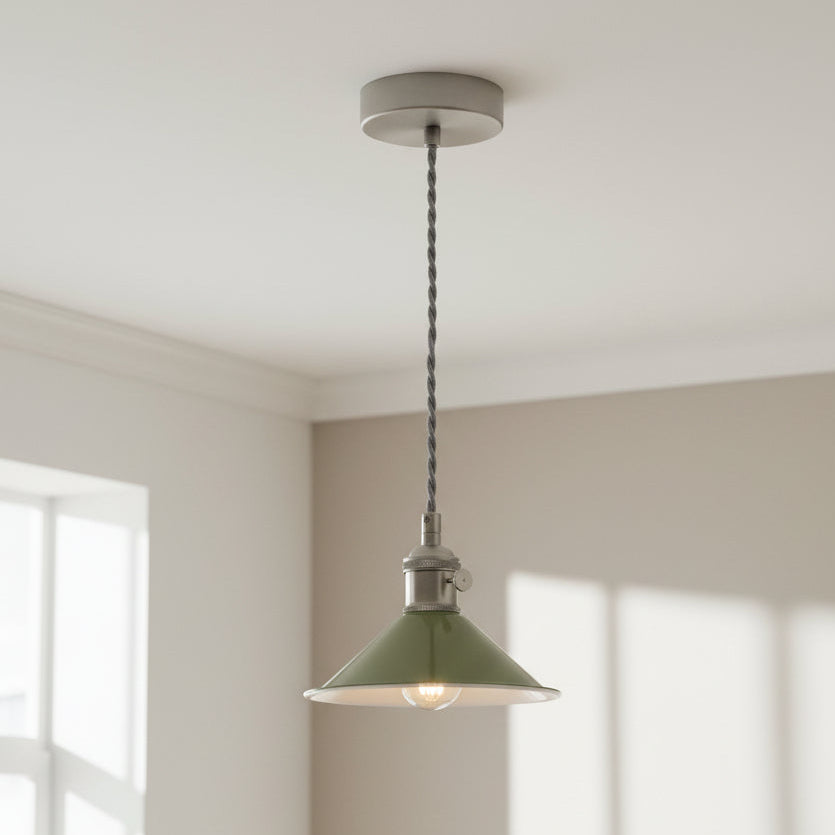 Green pendant light with a brushed steel ceiling rose and grey twisted cable. The shade is conical.