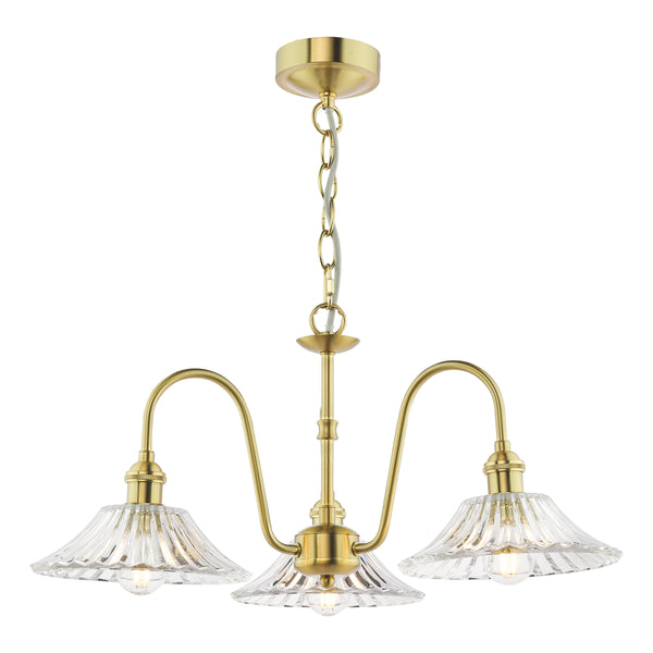Three-light brass chandelier with ribbed glass shades, hanging from a chain.