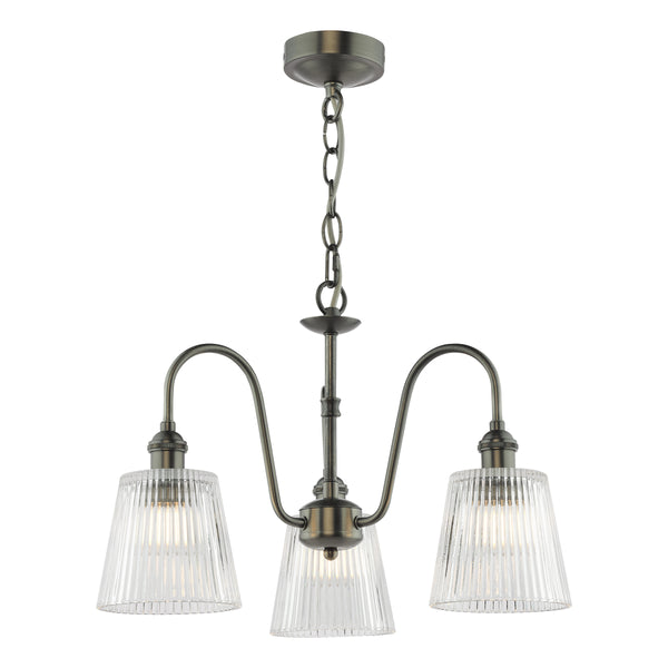 Antique brass chandelier with three ribbed glass shades, hanging from a chain.