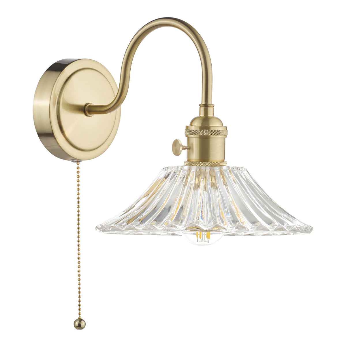 Brass wall sconce with a curved arm, a fluted clear glass shade, and a pull chain switch.