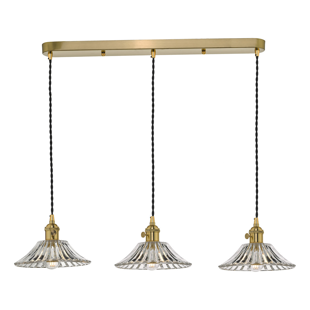 Three clear glass fluted pendant lights with brass fittings hang from a rectangular brass bar.