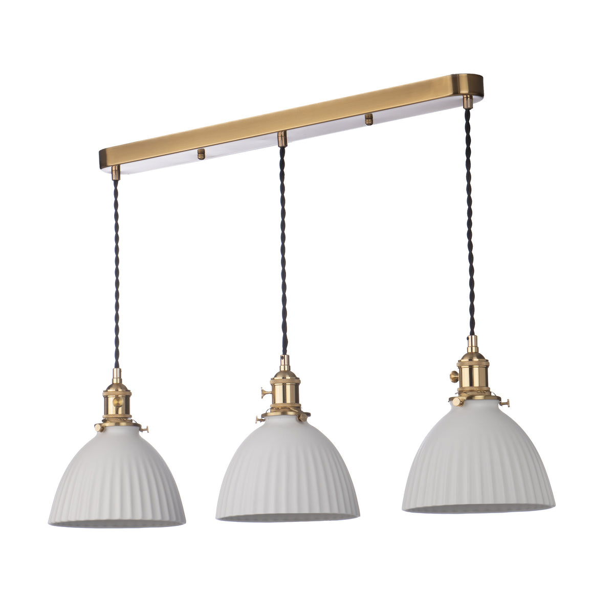 Three white fluted pendant lights with brass fittings hang from a brass bar.
