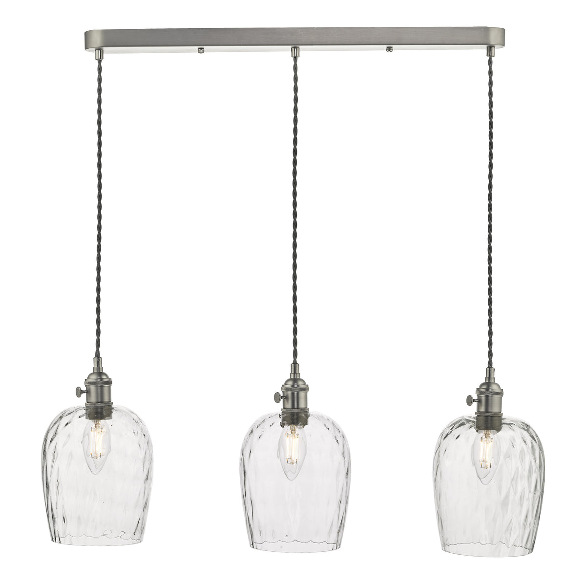 Three clear glass pendant lights with textured shades hang from a brushed metal bar.