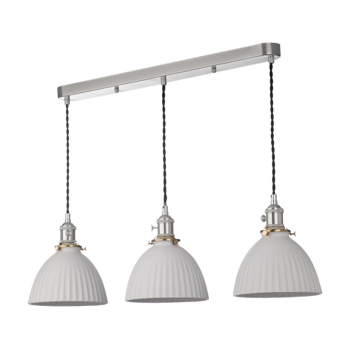 Three white fluted pendant lights hang from a brushed nickel bar, with black braided cords and brass accents.