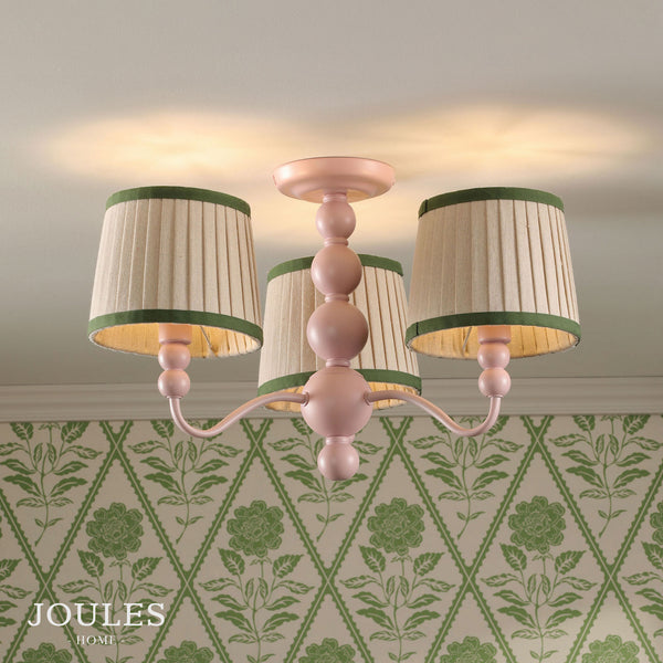 Joules Home three arm ceiling light with pink ball stem and pleated cream shades with green trim