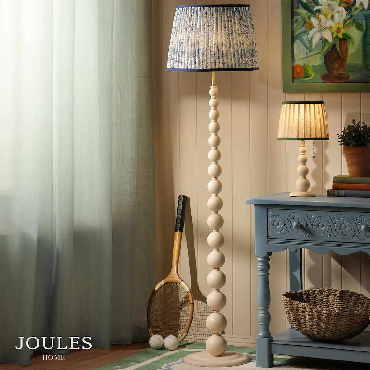 Joules Harewood floor lamp in matt cream with a blue pleated linen shade