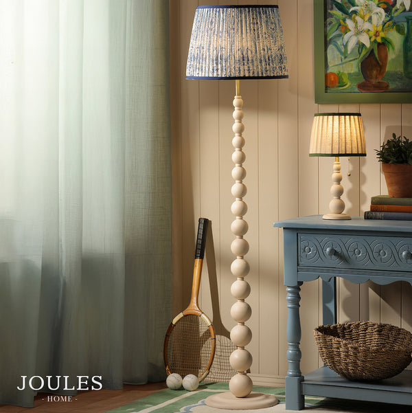 Joules Harewood floor lamp in matt cream with a blue pleated linen shade