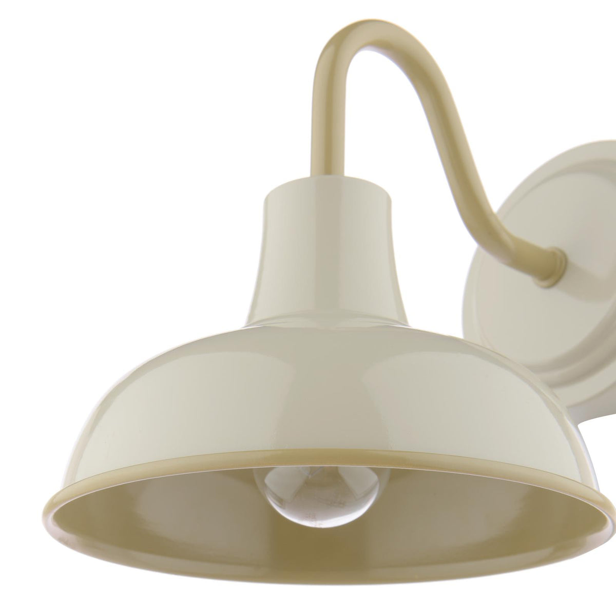 Cream colored farmhouse style wall sconce with a dome shade