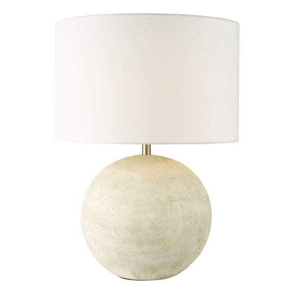 Round table lamp with a textured cream base and a plain white fabric shade