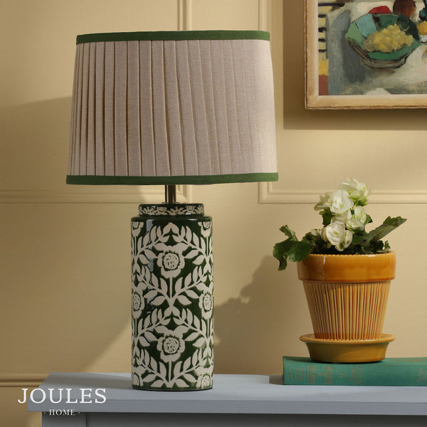 Joules Highclere ceramic table lamp in green with a pleated linen shade