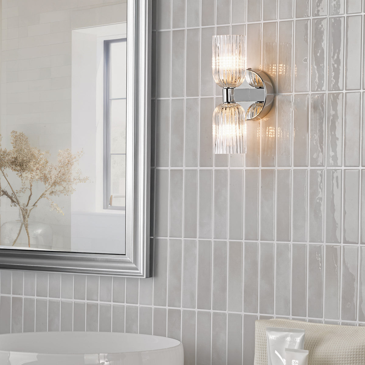 Hilaria IP44 Polished Chrome Up & Down Wall Light with Clear Ribbed Glass Shades