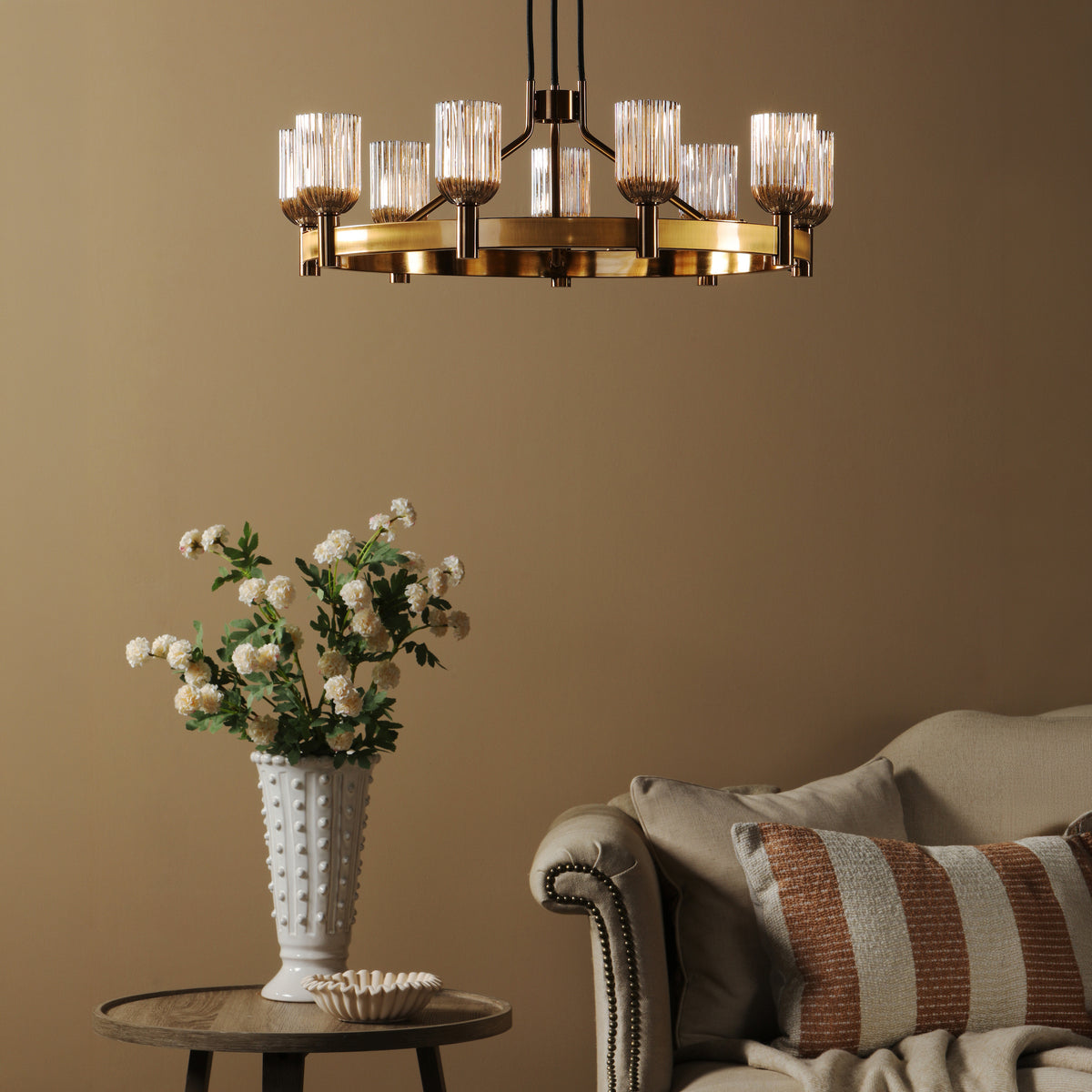 Hilaria Nine Light Pendant in Antique Gold with Amber Ribbed Glass Shades