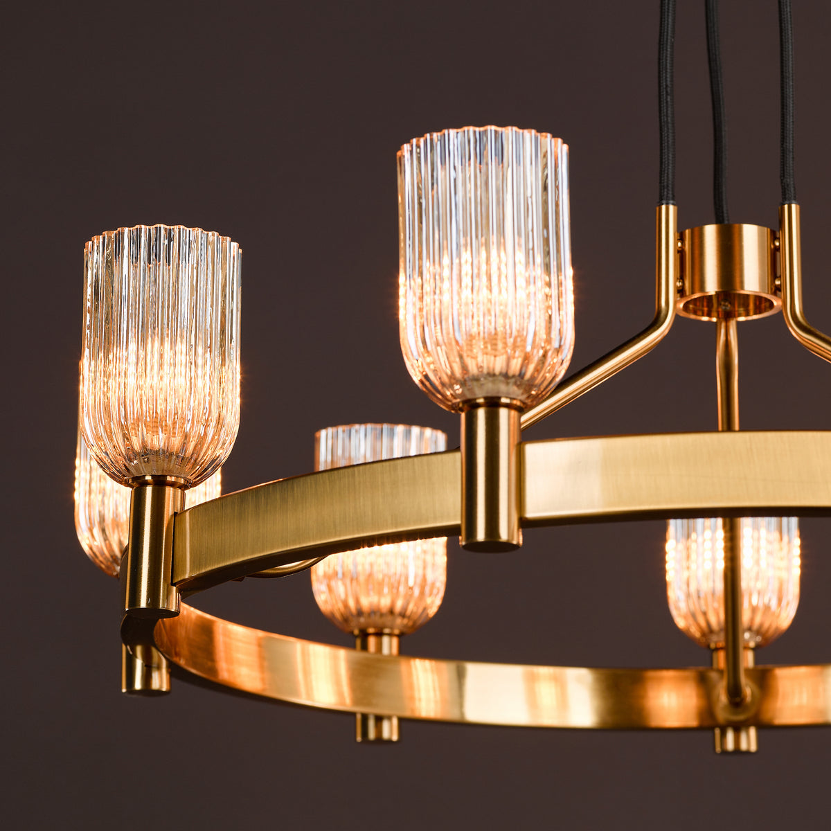Hilaria Nine Light Pendant in Antique Gold with Amber Ribbed Glass Shades