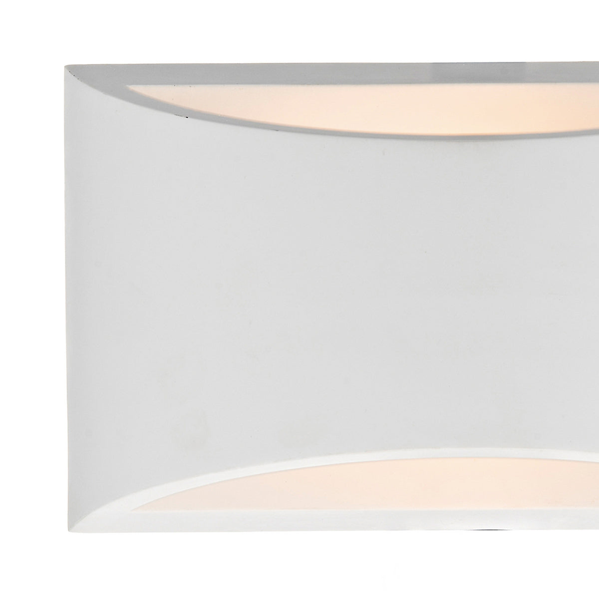 Close-up of a white rectangular wall sconce with light glowing from the top and bottom curved edges.