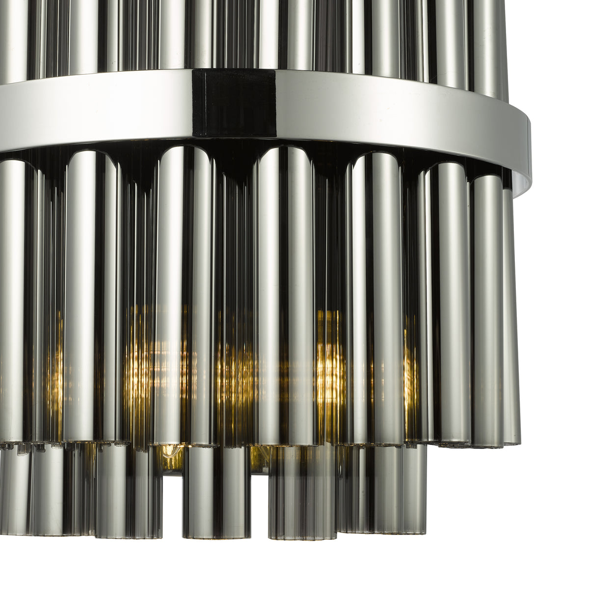 Close up of a polished chrome light fixture with vertical glass rods and illuminated bulbs