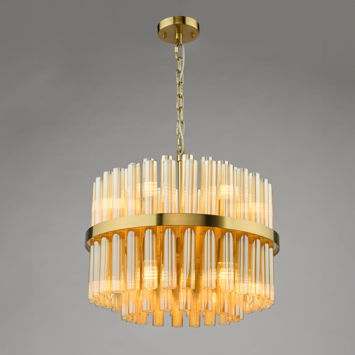 Gold chandelier with amber glass tubes