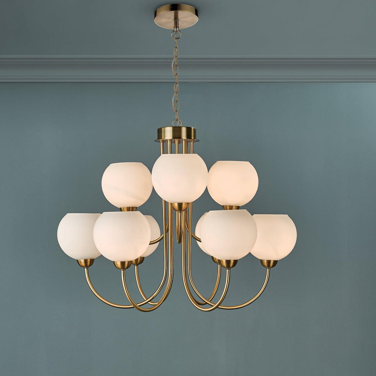 Indra Nine Light Pendant Chandelier in Natural Brass with Opal Glass Globes