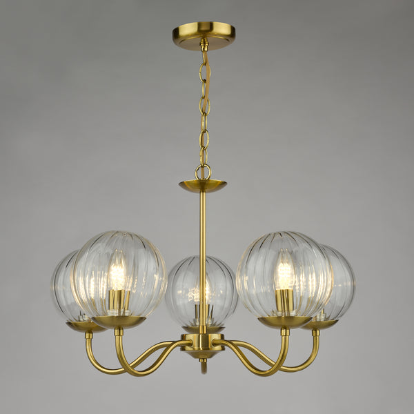 Jocelyn Five Light Armed Pendant Chandelier in Natural Brass with Glass Globes