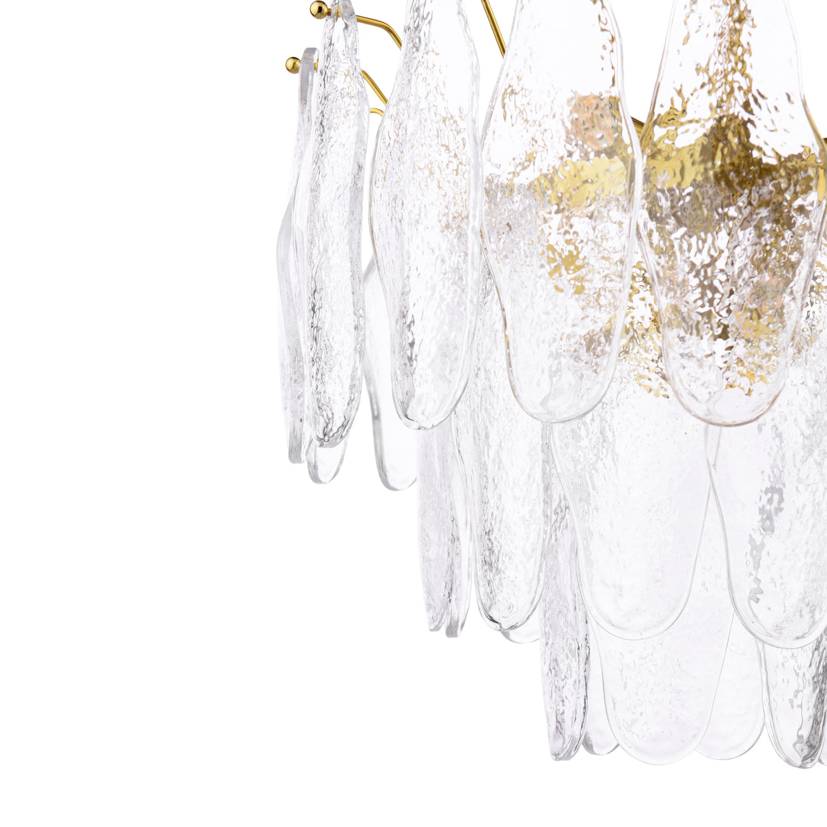 Close up of a gold chandelier with clear textured glass panels
