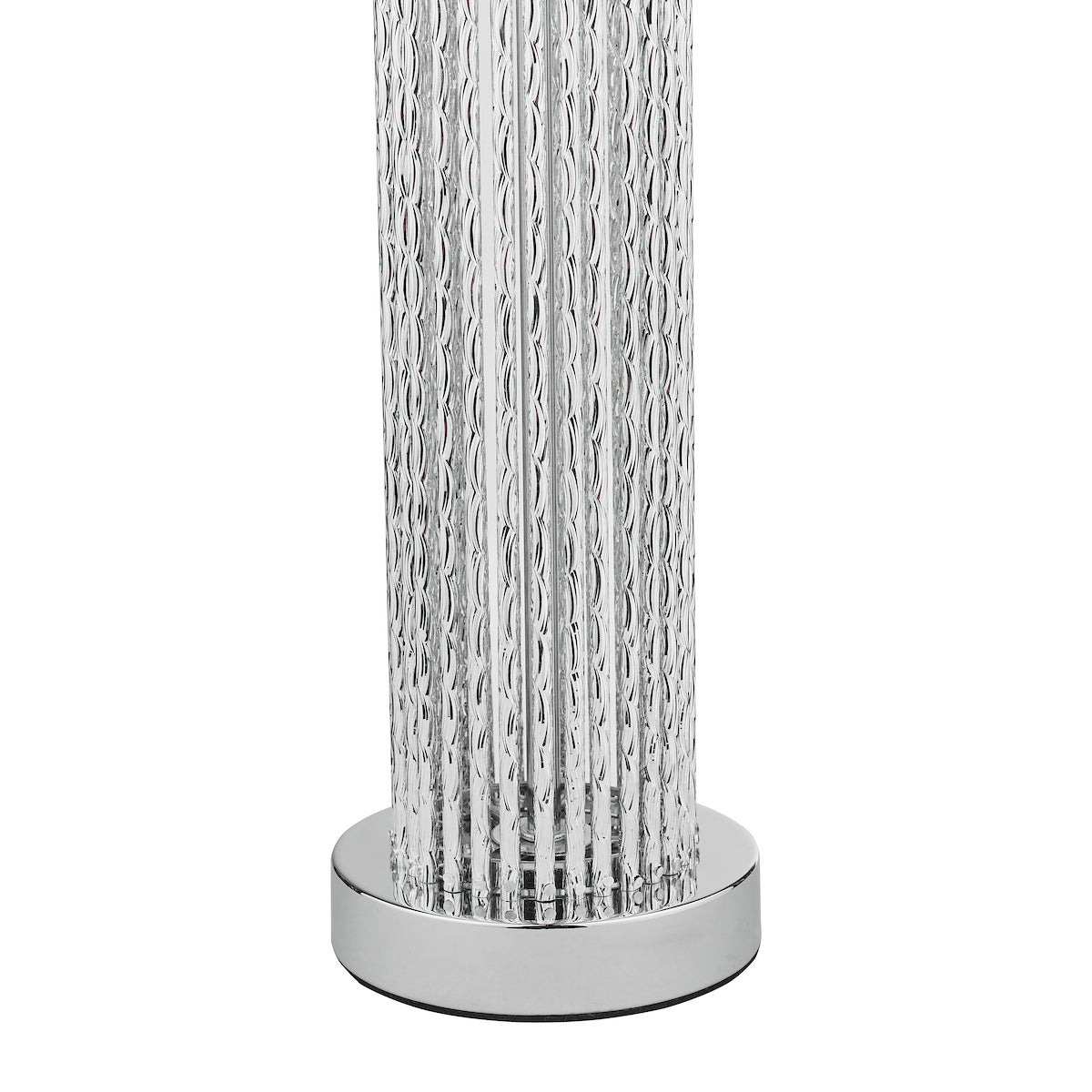 Close-up of a lamp base with a chrome finish and a textured glass column.