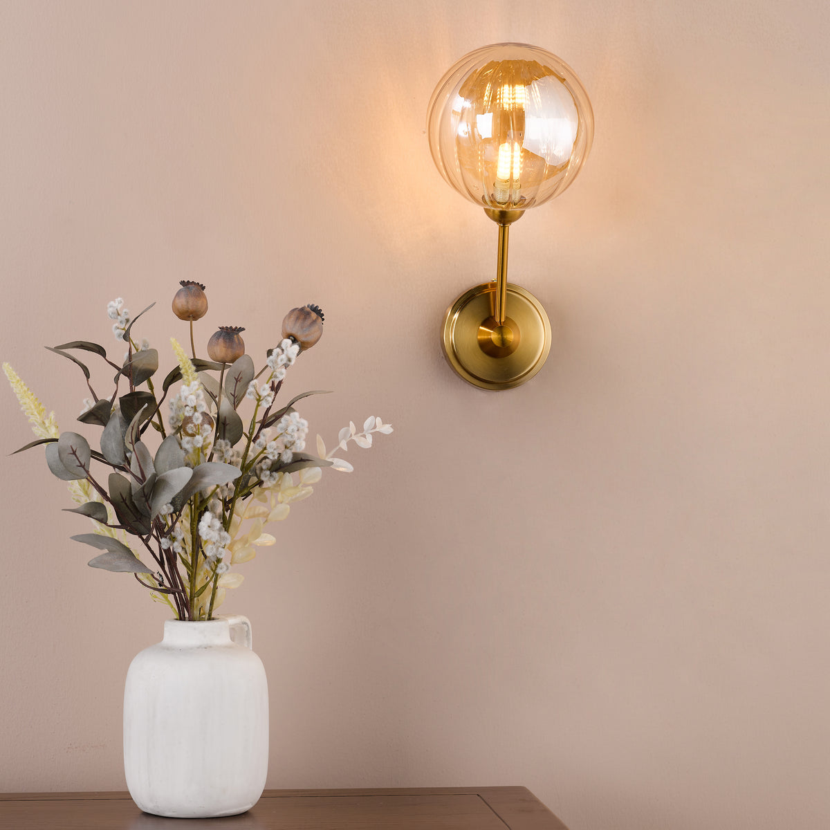 Liora Wall Light in Antique Gold with Ribbed Amber Glass