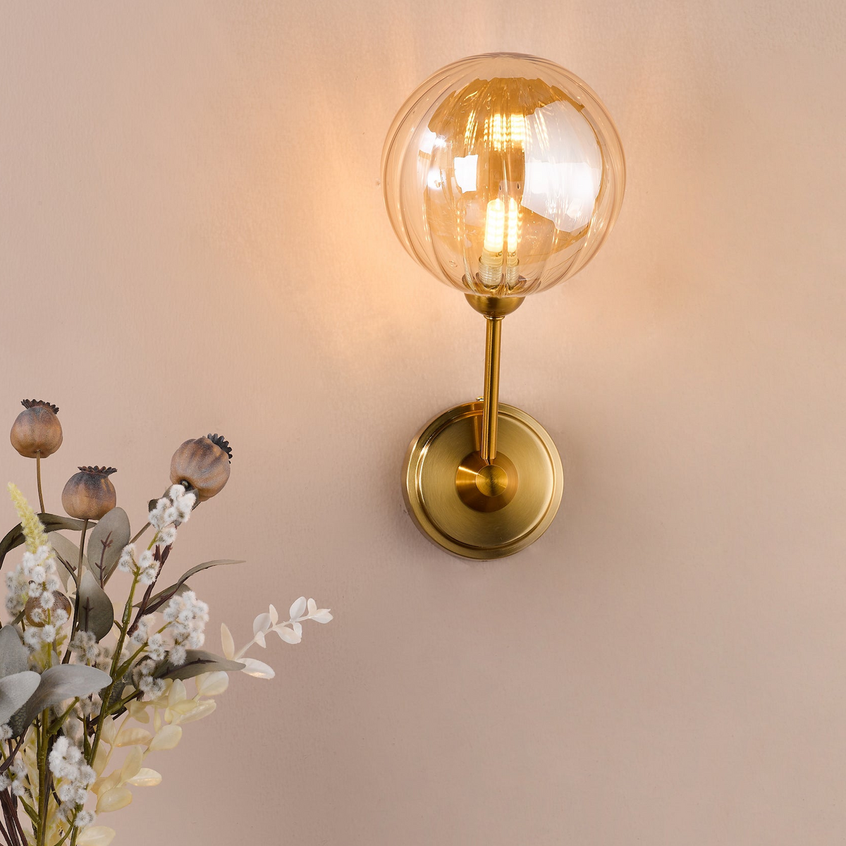 Liora Wall Light in Antique Gold with Ribbed Amber Glass