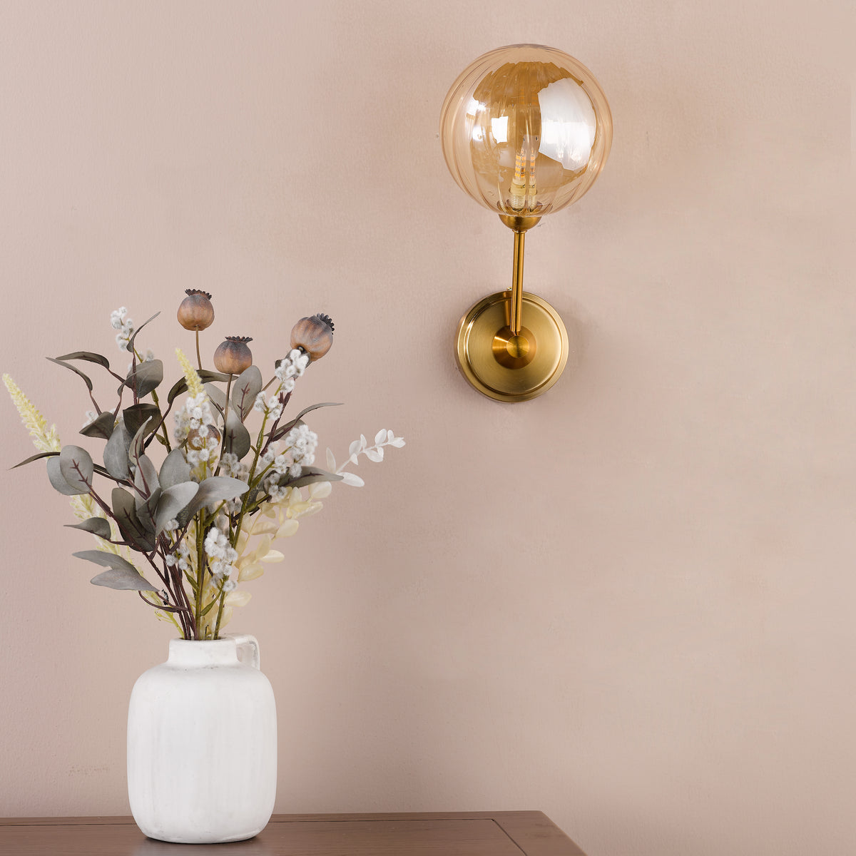 Liora Wall Light in Antique Gold with Ribbed Amber Glass