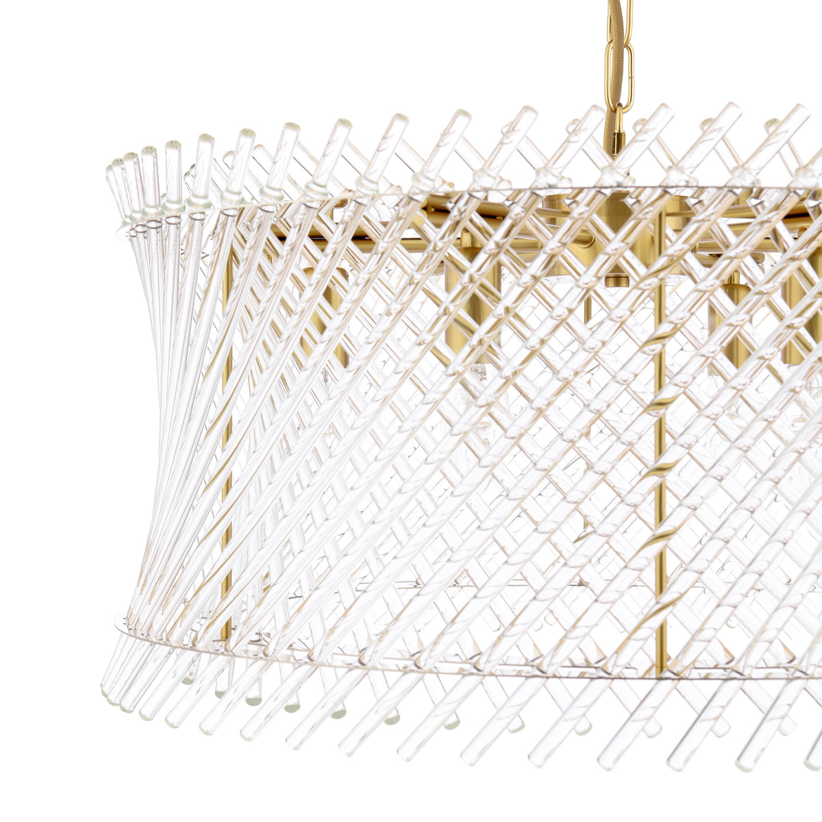 Close up of a gold chandelier with clear glass rods forming a spiral pattern
