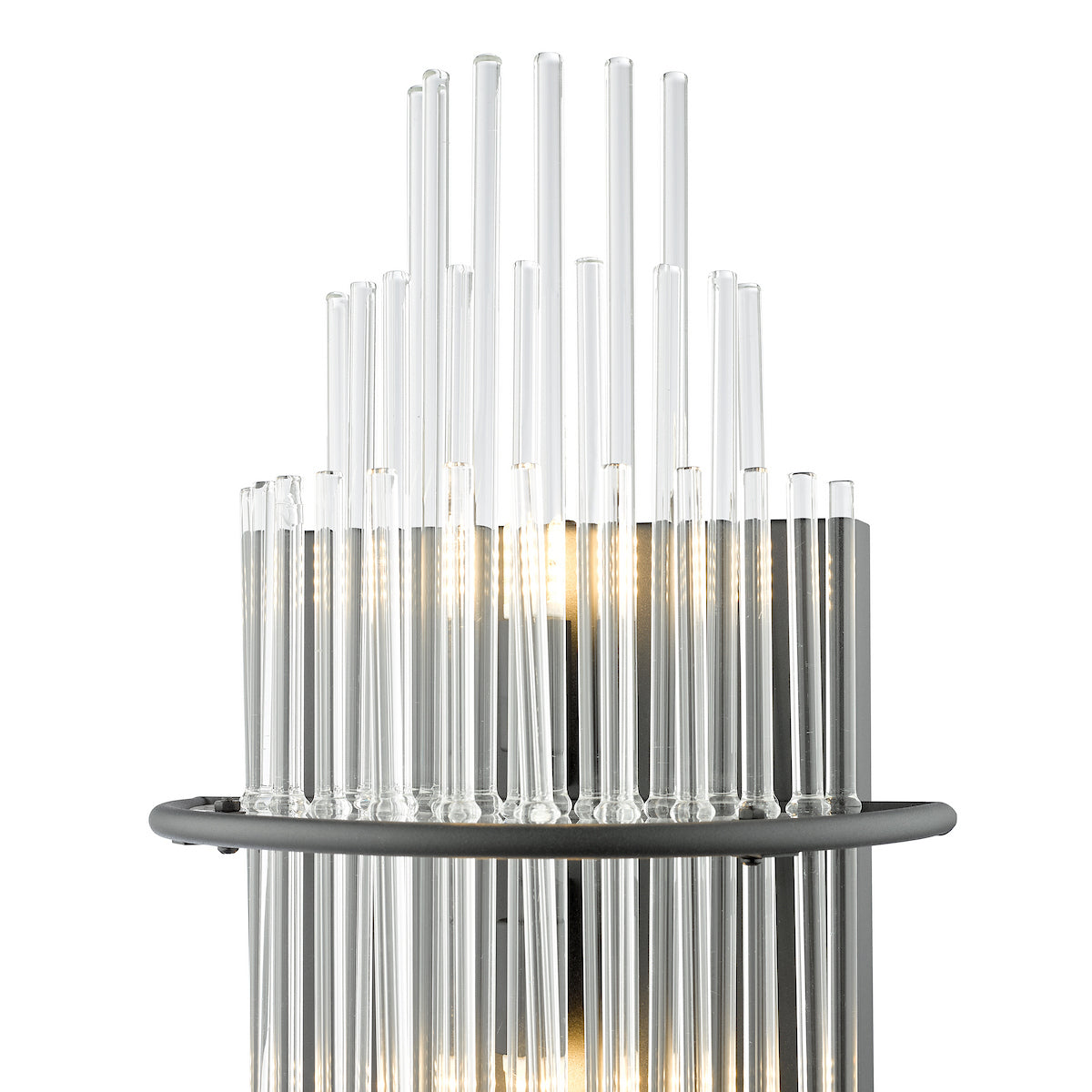 Close-up of a modern wall sconce with multiple clear glass rods and visible light bulbs.