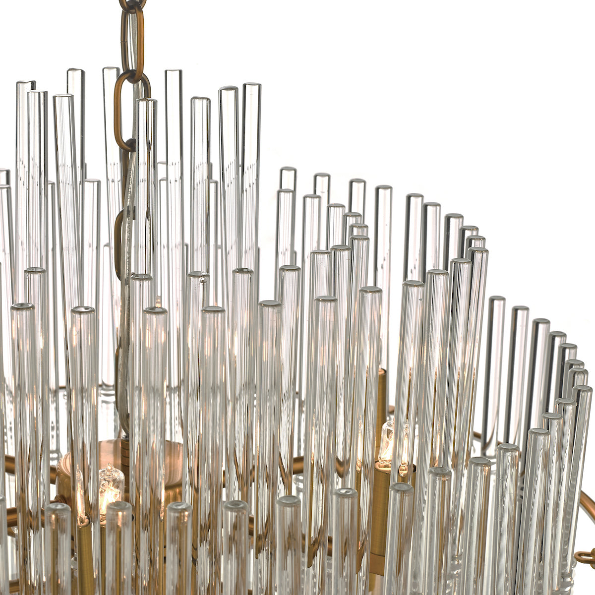 Close-up of a chandelier with clear glass rods and illuminated bulbs.