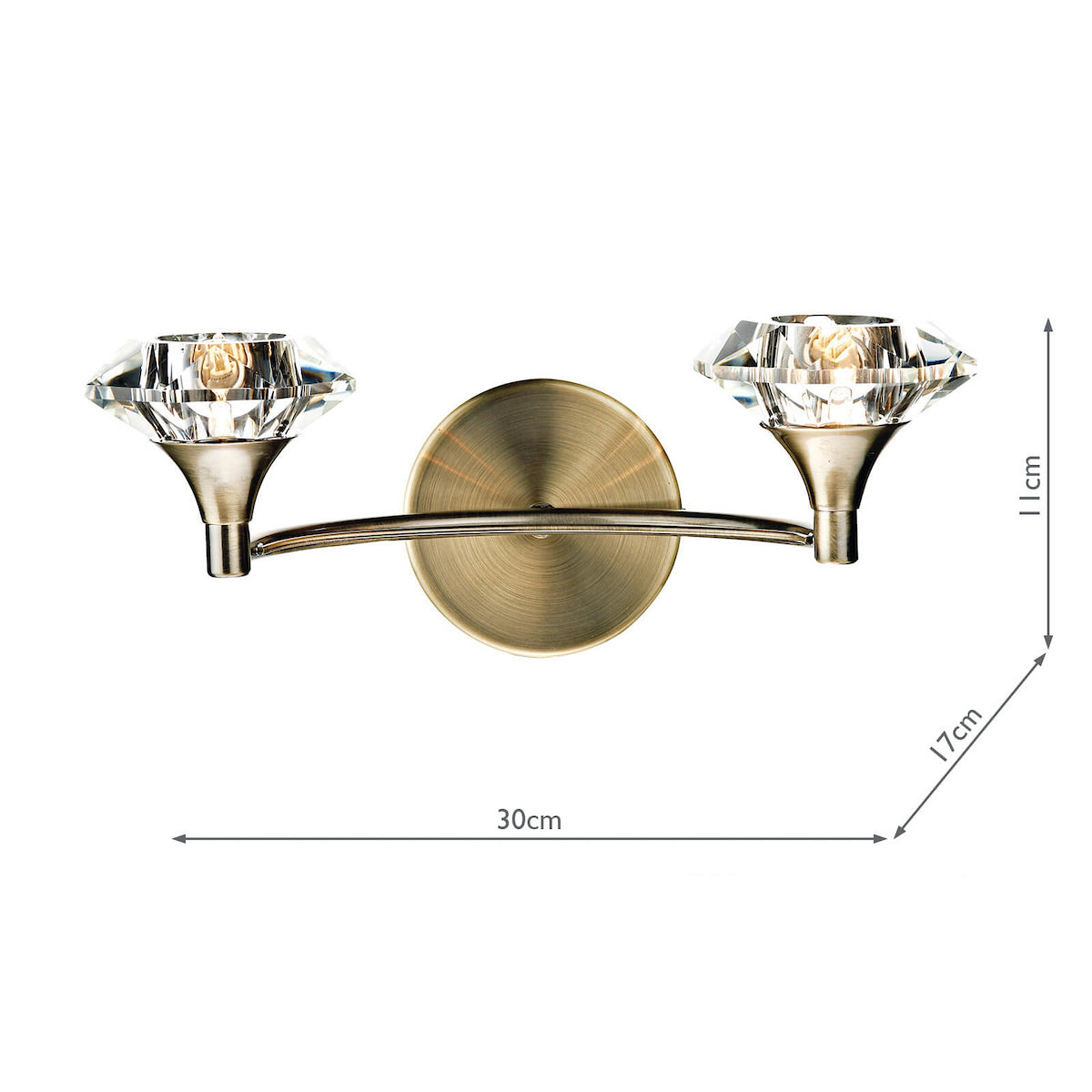 Antique brass wall light with two crystal shades, showing dimensions of 30cm width, 17cm depth, and 11cm height.