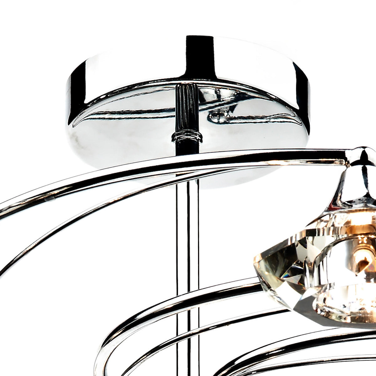Close-up of a modern chrome ceiling light with crystal accents and curved arms.