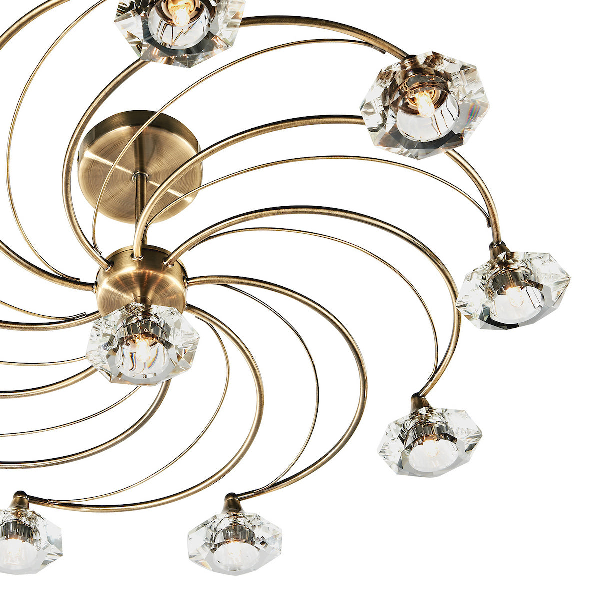 Bronze ceiling light with spiral arms and crystal shades.