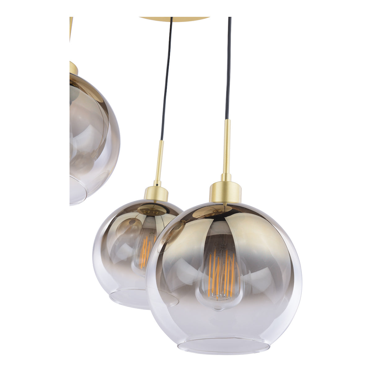 Three pendant lights with gold hardware and smoked glass globes, revealing Edison bulbs.