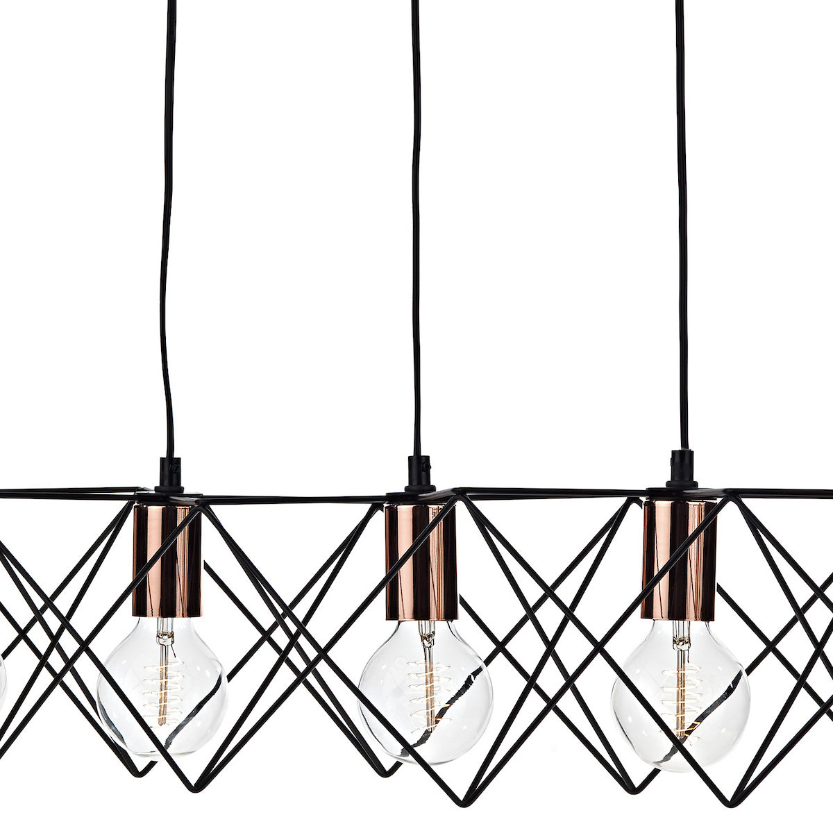 Three light bulbs with copper bases hang from black wires inside a black geometric metal frame.